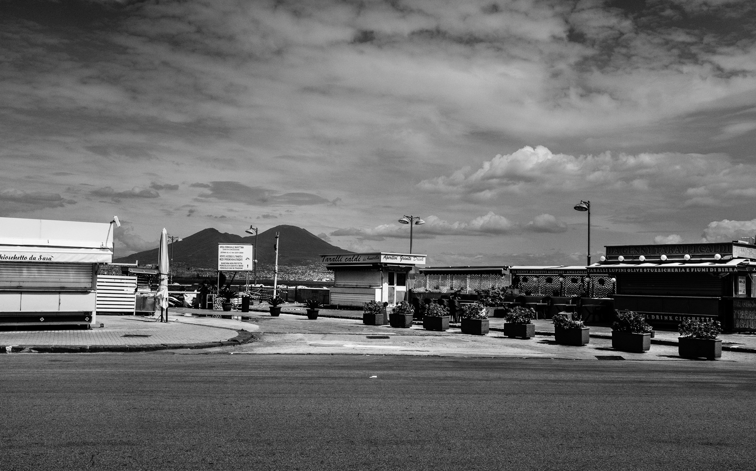 The empty streets in Naples the Mount Vesuvius in the background. An attentive monitoring of the many ways in which organized crime adapts to changing conditions is a real priority in a city like Naples