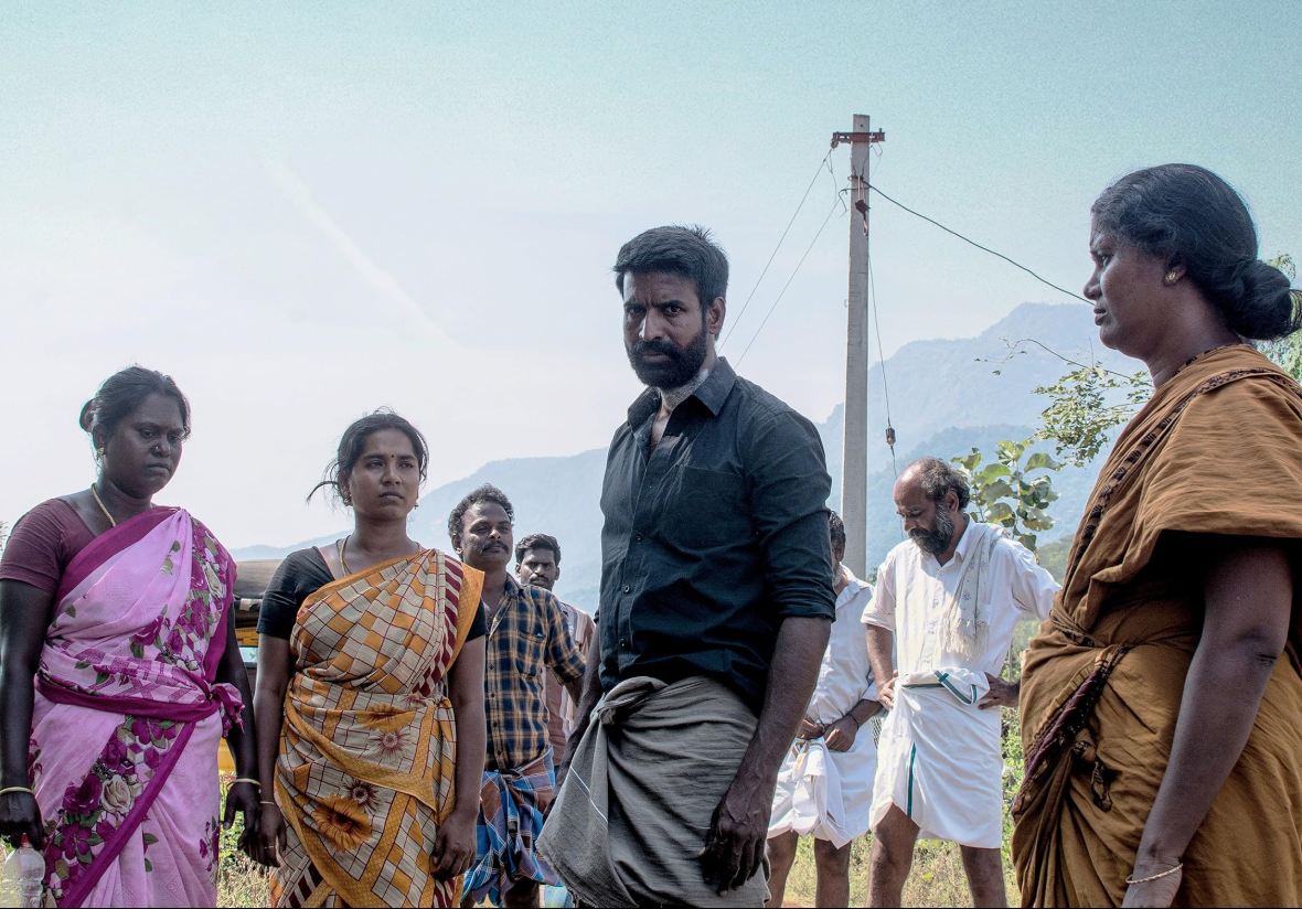 A still from Kottukkaali showing Pandi and others in Meena's village.