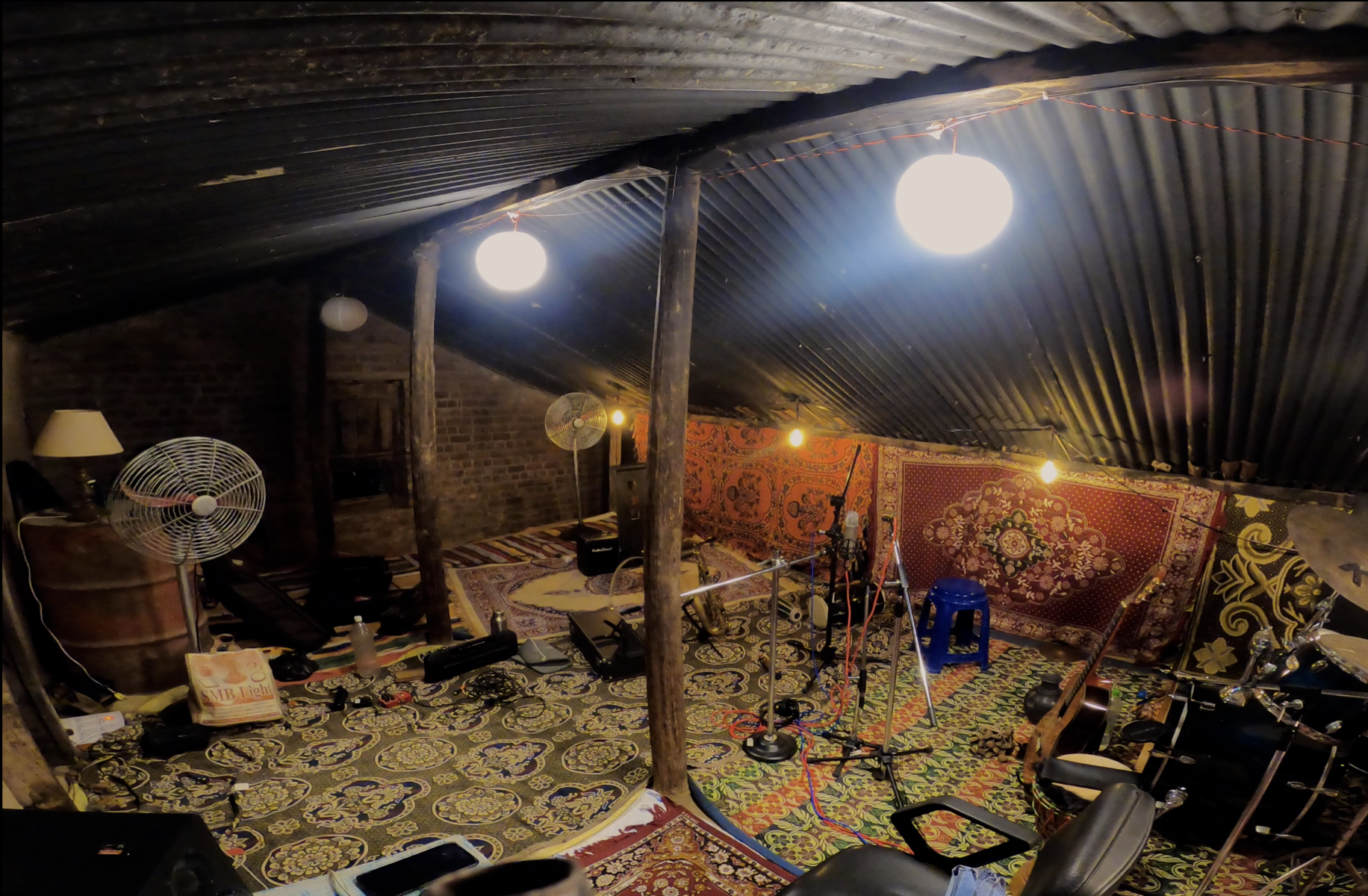 The duo transformed the tattered space into a functional studio, using the gear they brought with them and rugs borrowed from the neighboring village. (Photo by Akshat Vijayvargiya)