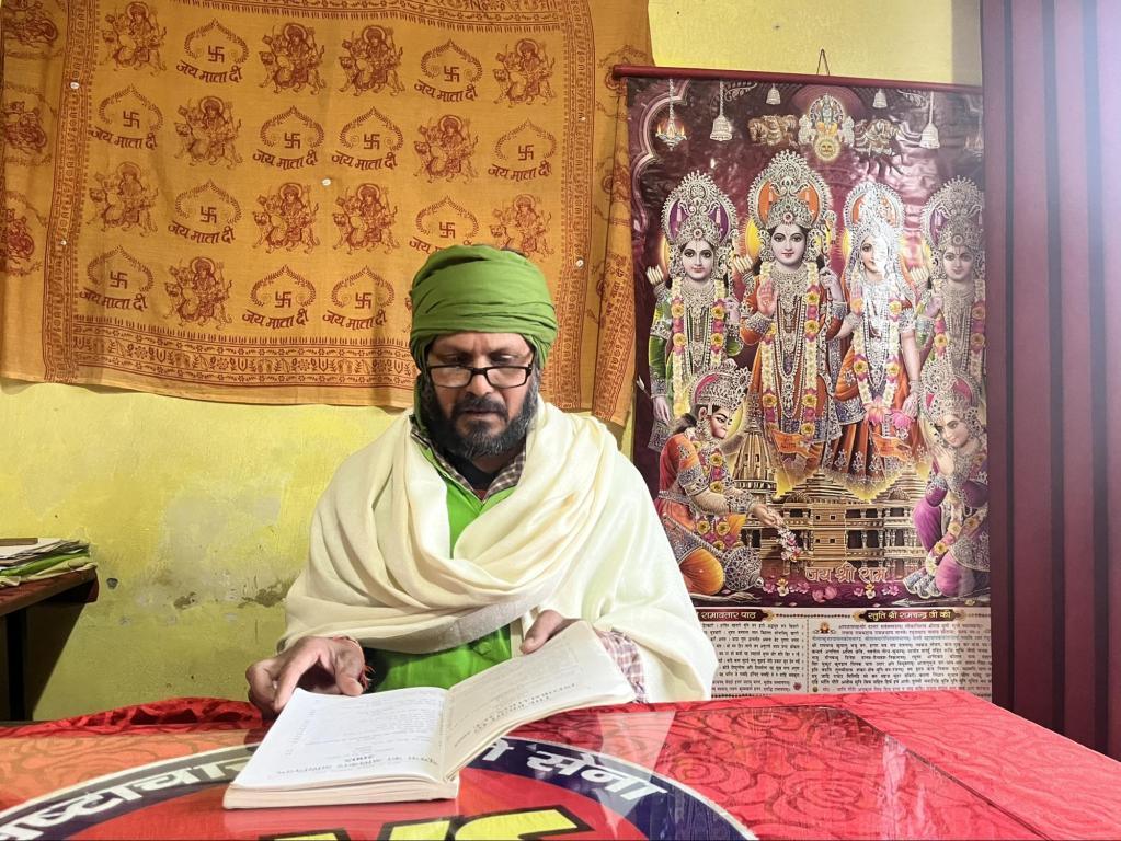 Pandit Keshav Dev Gautam at his office in Aligarh.